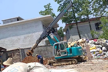 Small excavator modified rotary drilling rig