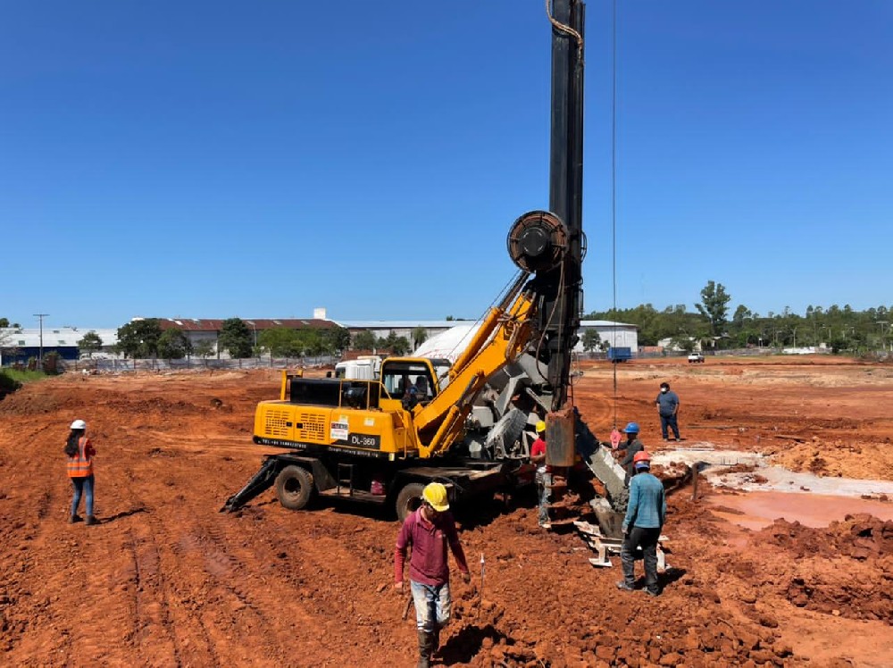 Wheeled rotary drilling rig used for construction of power piles on site